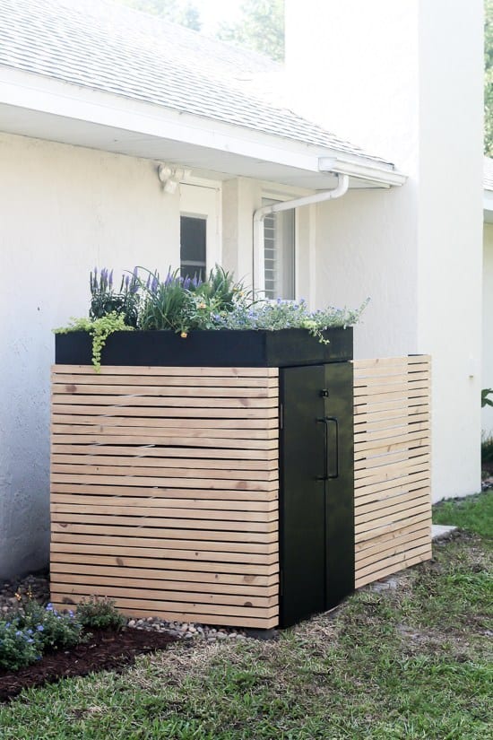 utilities cover in side yard of house