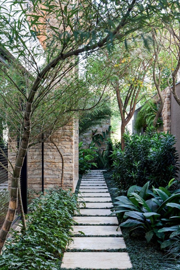 Side yard pathway with pavers and landscaping