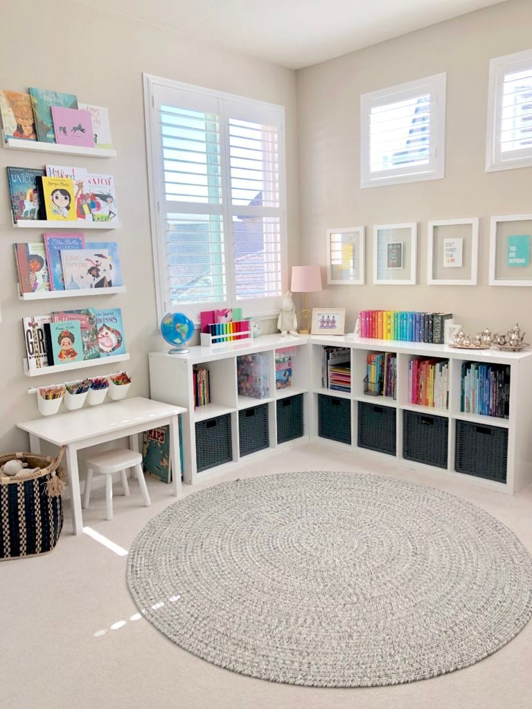 decluttered playroom - organized shelving and supplies