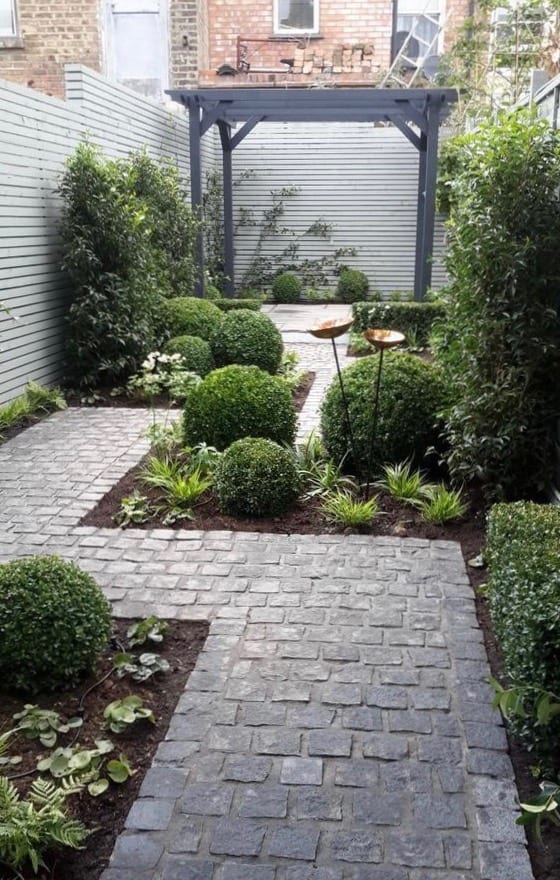 Side yard leading to pergola
