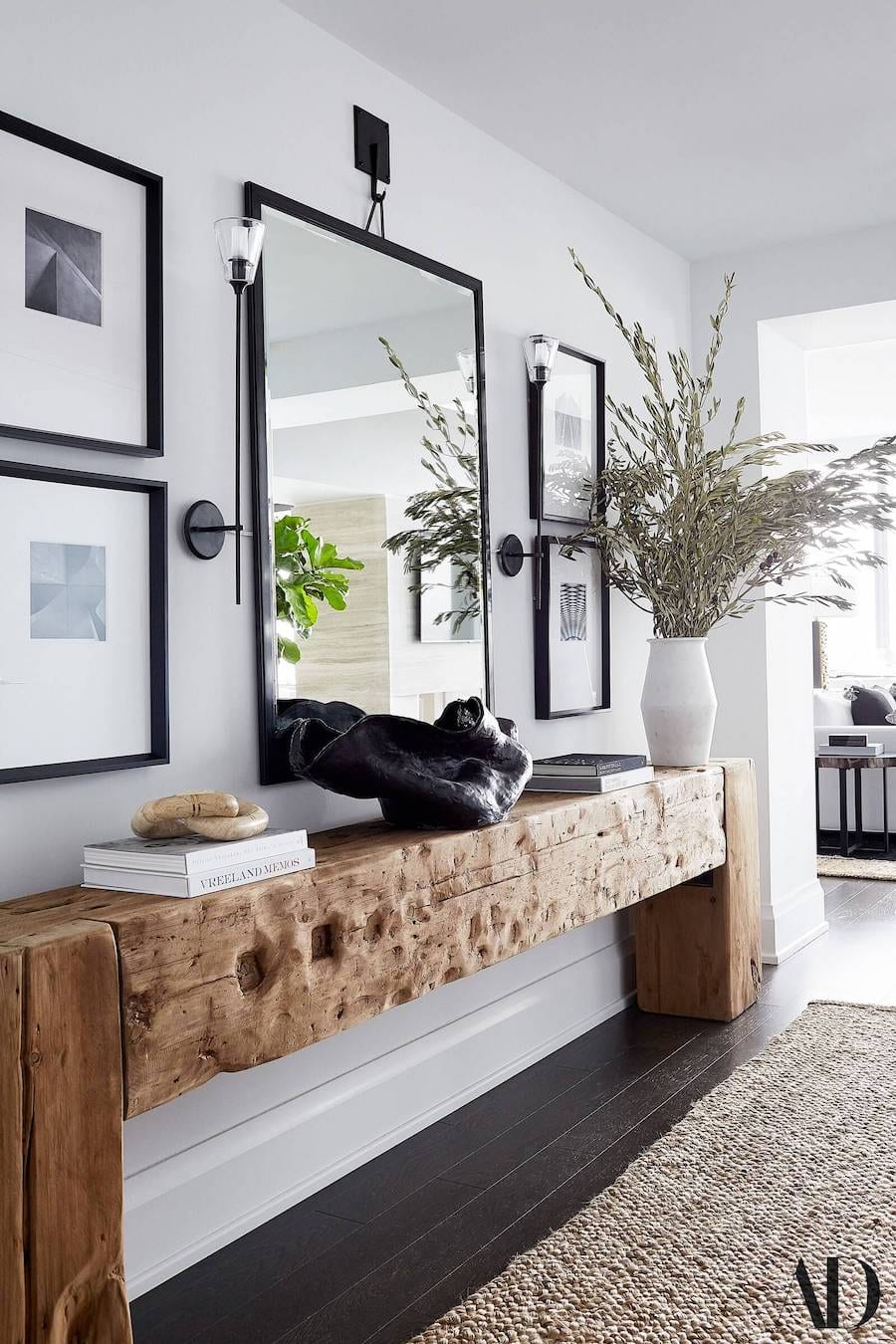 entrway with oversized mirror and console