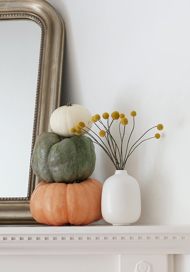 fall mantel with small squashes