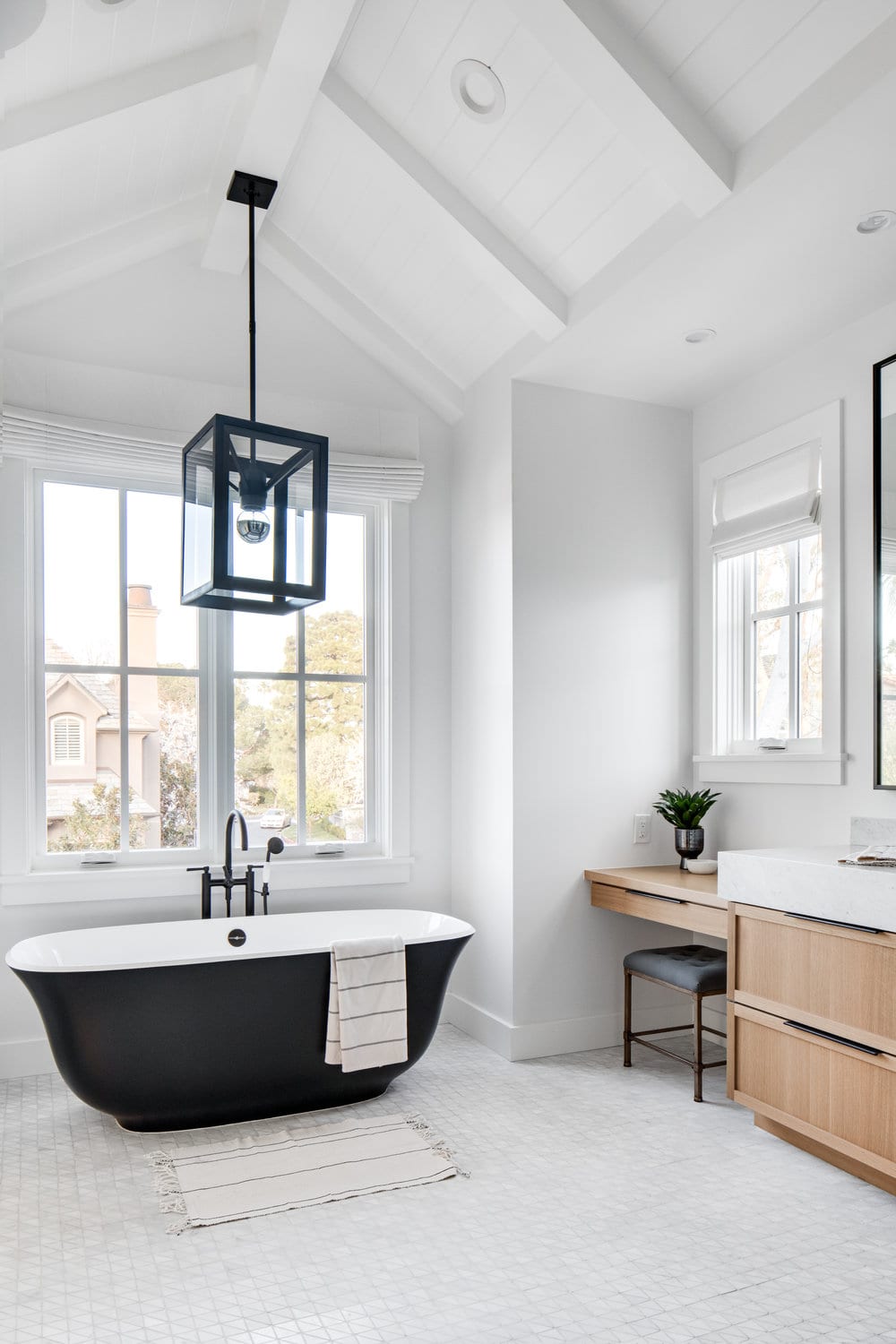 black statement bathtub master bathroom