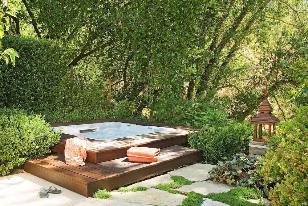 hot tub with platform and steps