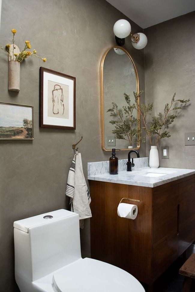 mixed metal finishes in powder room
