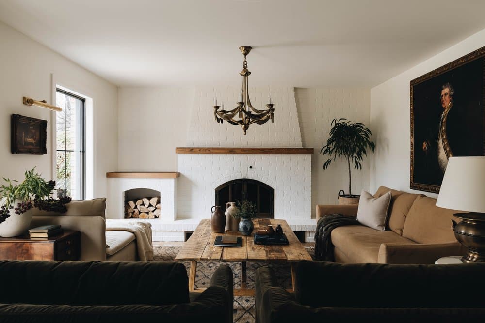brick rustic fireplace with wood mantel