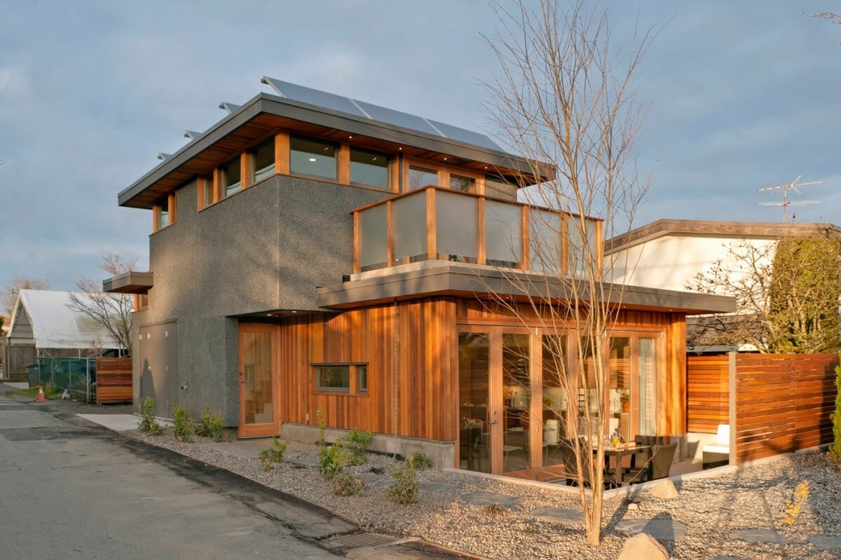 Laneway house with solar panels seen from laneway