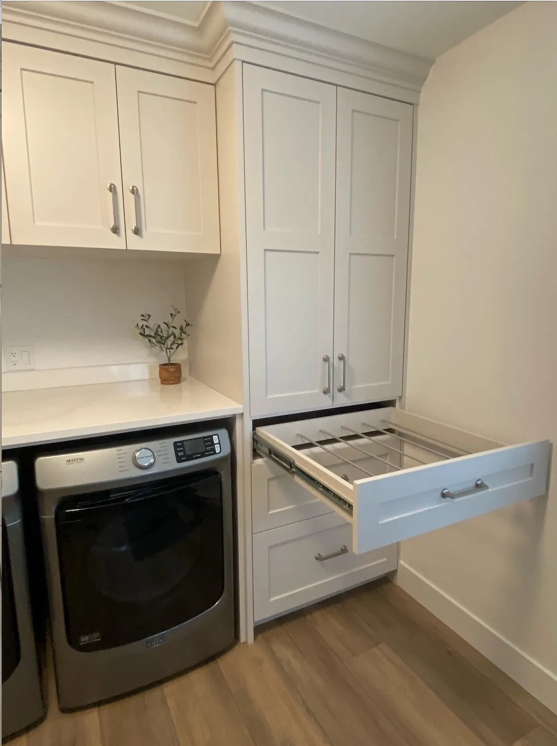 pull-out drying rack in laundry room