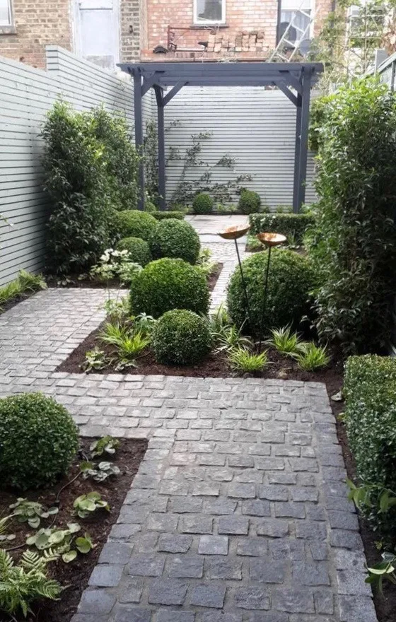 Side yard leading to pergola