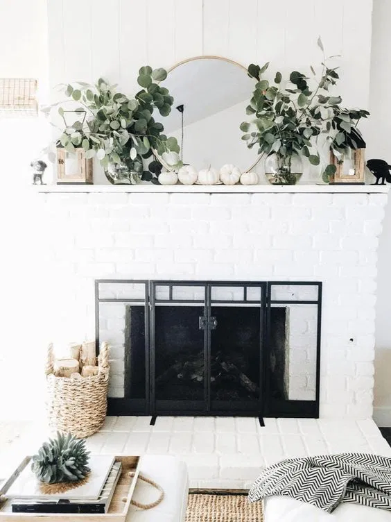 fall decor around fireplace