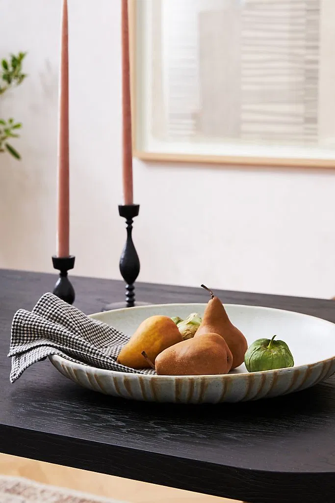 fall fruit in bowl with candles